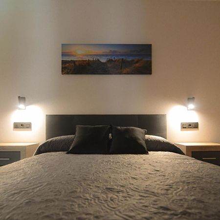 Apartamentos Fuente La Pipa Avin Bagian luar foto