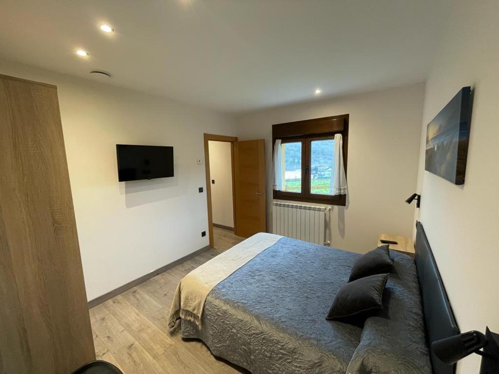 Apartamentos Fuente La Pipa Avin Bagian luar foto
